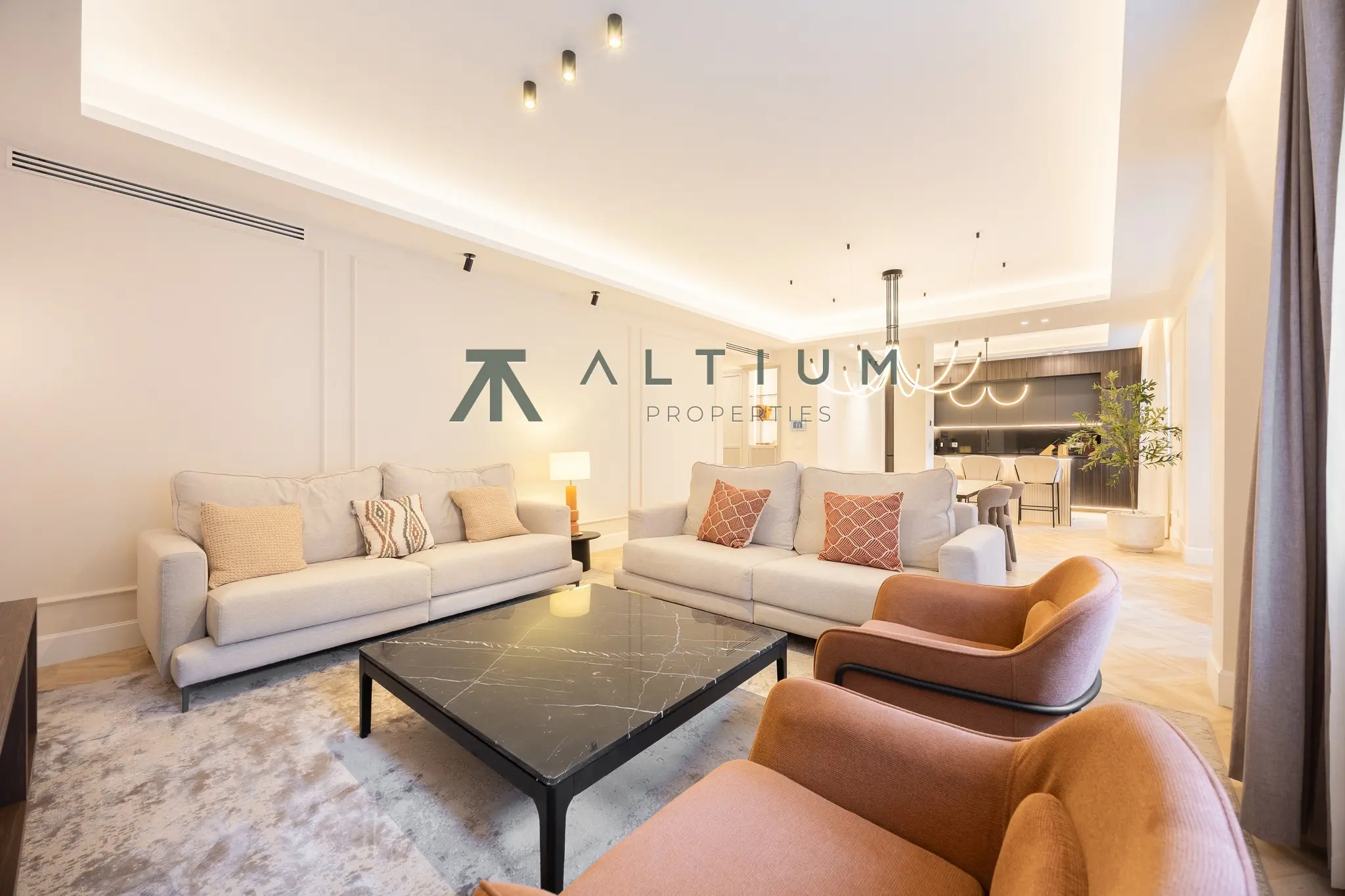 A generous living room, island kitchen and four double bedrooms