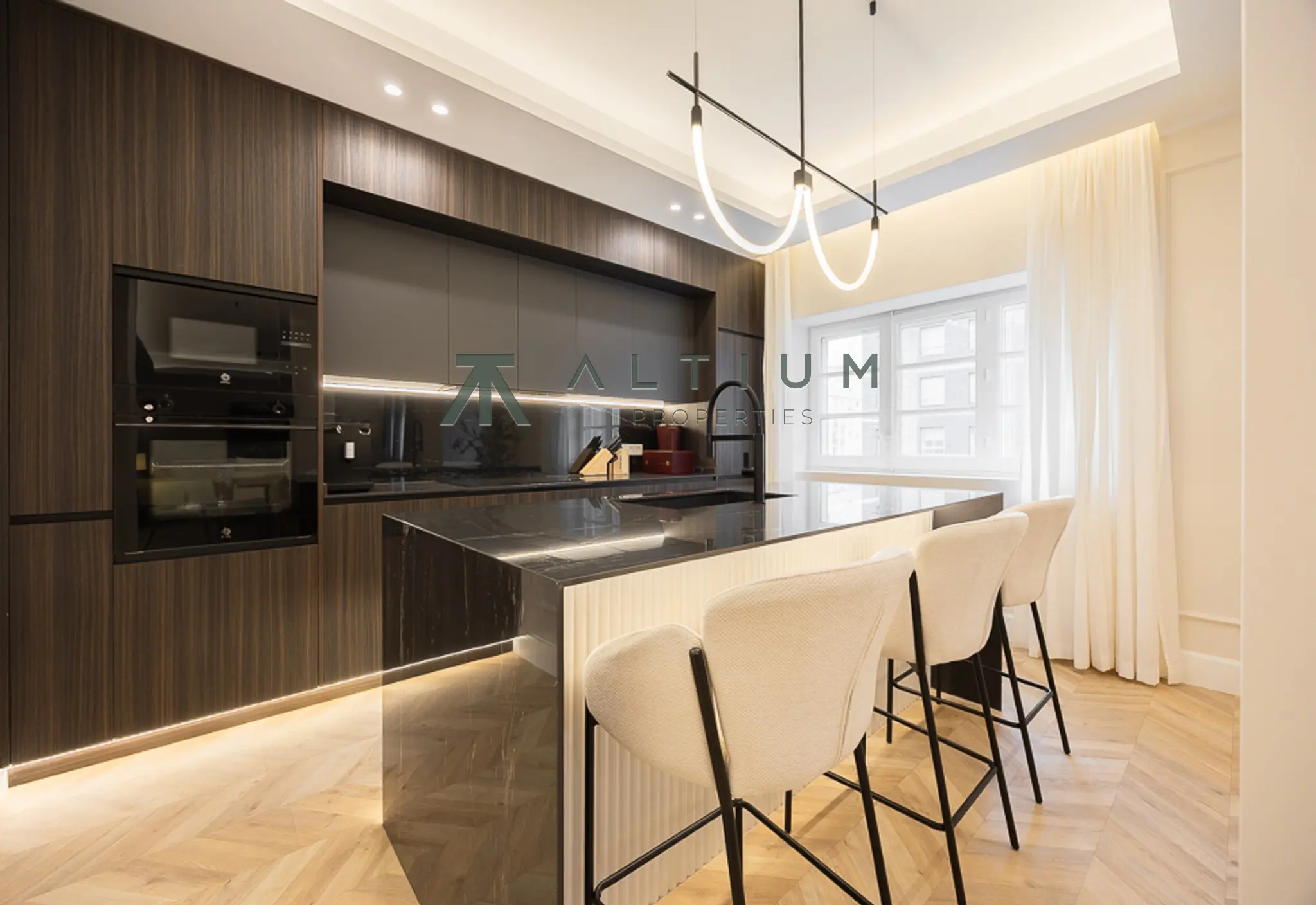 A generous living room, island kitchen and four double bedrooms